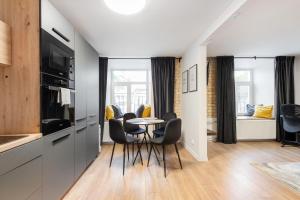 Newly Refurbished Lukiskiu Square Apartment by Reside Baltic
