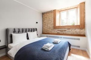 Newly Refurbished Lukiskiu Square Apartment by Reside Baltic