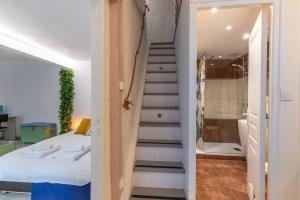 Maisons de vacances Le Troglogite Mignon - Maison et Jardin : photos des chambres