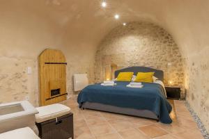 Maisons de vacances Le Troglogite Mignon - Maison et Jardin : photos des chambres