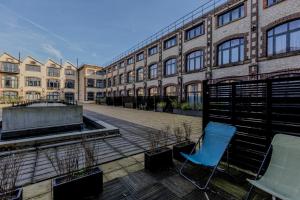 Appartements Manhattan Loft - centre - 5 mn a pied gare - parking prive - patio : photos des chambres