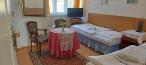 Twin Room with Extra Bed (3 Adults) room in Hotel Garni