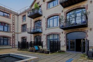 Appartements Manhattan Loft - centre - 5 mn a pied gare - parking prive - patio : photos des chambres