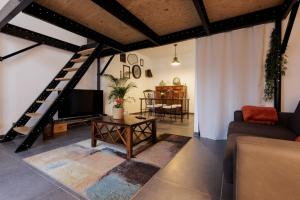 Appartements Manhattan Loft - centre - 5 mn a pied gare - parking prive - patio : photos des chambres