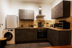 Appartements Manhattan Loft - centre - 5 mn a pied gare - parking prive - patio : photos des chambres