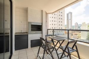 Apto vista mar c churrasq. em Itapema GBL601