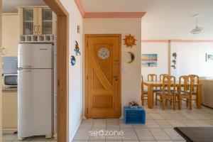 Apto vista mar c churrasq. em Itapema GBL601