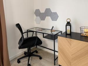 Appartements Au coeur des Arenes - Parking prive : photos des chambres