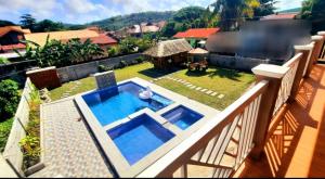 LS Resthouse - Loft studio with pool and garden access