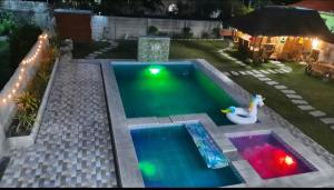 LS Resthouse - Loft studio with pool and garden access