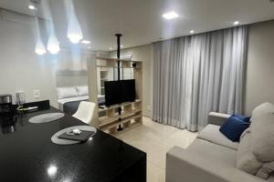 Studio 100% mobiliado e decorado 26