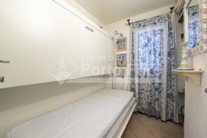 26 Baia del Faro - Trilocale con patio e giardino vista mare