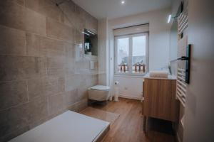 Appartements L-Exile • l-Oasis de tranquillite en Coeur de Ville : photos des chambres