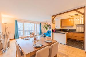 2 BR apartment with balconies & private parking