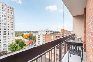 2 BR apartment with balconies & private parking