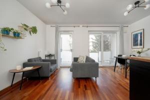 Black and Brown Apartment with Free Parking and Furnished Balcony in Wrocław by Renters