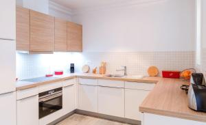 Luxury Three Bedroom Residence Sea View room in Lustica Bay Apartments