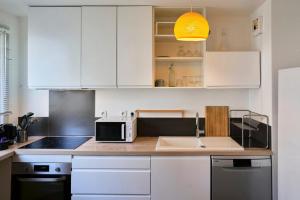 Appartements Apartment balconyparking space near train station : photos des chambres