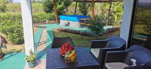 Arenal Nephelium Country Home, Refugio rural con piscina, jacuzzi y balcón con hermosas vistas al Volcán Arenal, en una finca privada