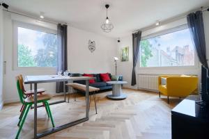 Appartements Lille Republique - 2ch tres lumineux + Parking ! : photos des chambres