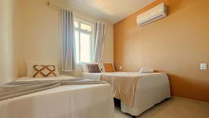 2 suítes temporada - VENTILADO E NASCENTE, condomínio tranquilo com PISCINA, CHURRASQUEIRA E PLAYGROUND I Cozinha completa, estacionamento coberto, home office I Ideal para FAMÍLIAS E CASAIS I Prox do BEACH PARQUE e PRAIA - Porto das Dunas - CE