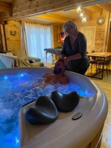 L'Enseigne -Location de 2 chalets privatifs avec Spa : photos des chambres