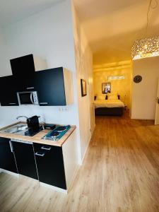 Wohngut-City Apt. 1 Zi. 1 DB + 1 EZ 34 qm mit Parkplatz