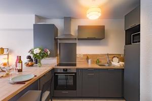 Appartements Appart cosy avec grand balcon et parking privatif : photos des chambres
