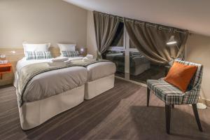 Appart'hotels Les Chalets Du Jardin Alpin : photos des chambres