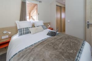 Appart'hotels Les Chalets Du Jardin Alpin : photos des chambres