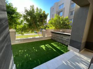 Lovely 2BR Apartment with Garden and Barbecue Area