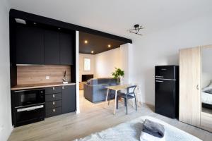 centre ville grand studio neuf climatisé +balcon