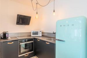 Appartement lumineux avec rooftop et garage privé.