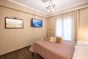 Two-Bedroom Apartment with Balcony room in Mathraki Resort