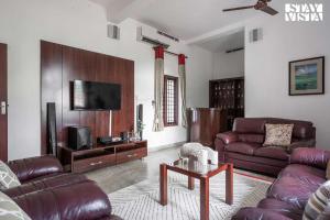 StayVista at Periyar Palace- Pet Friendly, River View Villa with Garden