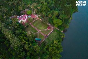 StayVista at Periyar Palace- Pet Friendly, River View Villa with Garden