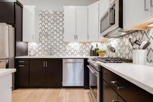 1-Story Condo Near Vandy, Elevator, Garage, Patio Two Bedroom with 1 King and 2 Queens, Walk to Campus and Centennial Park, 10 Mins to Downtown, 24 Hr Hospitality