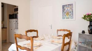 Appartements L'Intemporel - Appartement T3 avec jardinet : photos des chambres