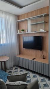 Apartamento ensolarado em condomínio clube