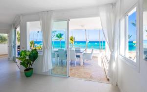 Beachfront Punta Cana Condo for Rent - Ocean View, Private Terrace, and BBQ