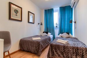 UnitApartament Warszawa Centrum Room in Apartment by Metro Rondo ONZ Super wygodne noclegi zapraszamy