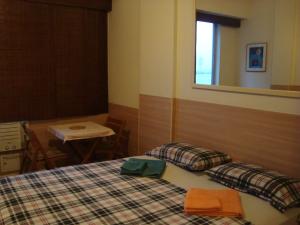 Alex Rio Flats Studio Beach View