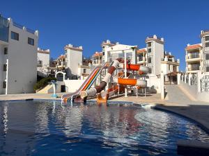 3-Bedroom Apartment on the Third Floor with 3 Balconies and lovely Pool View, Street View and Free Beach Access in Sharm Hills Resort