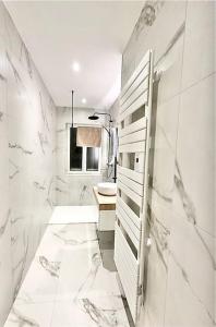 Appartements L-Eclat Prestigieux : Quartier Henriville : photos des chambres