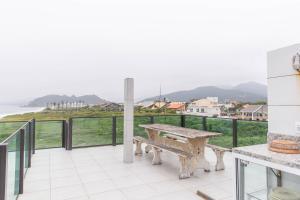 Cobertura com churrasqueira frente mar!