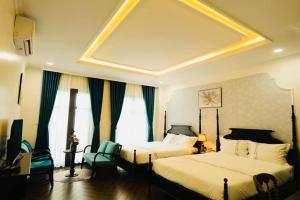 Khách Sạn The One Hotel 2