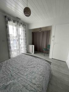 Maisons de vacances Maison 6 personnes Soulac Climatisee Fibre : photos des chambres