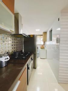 Apartamento De frente ao mar, linda varanda com churrasqueira