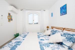 Appartements La Joliette - Parking prive et piscine partagee : photos des chambres