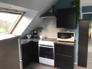 Maisons de vacances gite de la scierie : photos des chambres